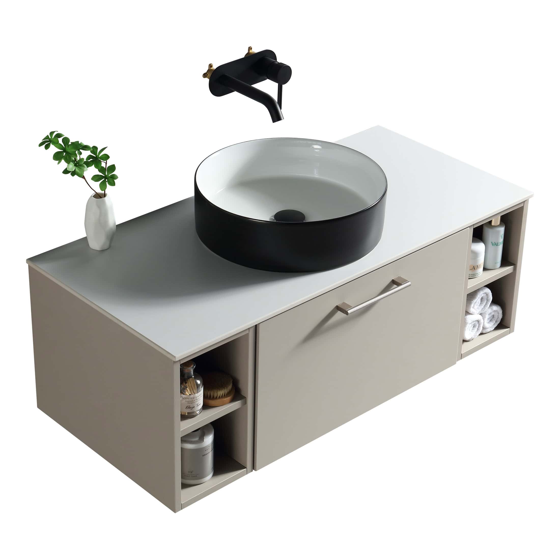 Minimalist bathroom vanity with a modern round basin sink, black faucet, and storage shelves for toiletries, designed for stylish and functional bathroom decor.