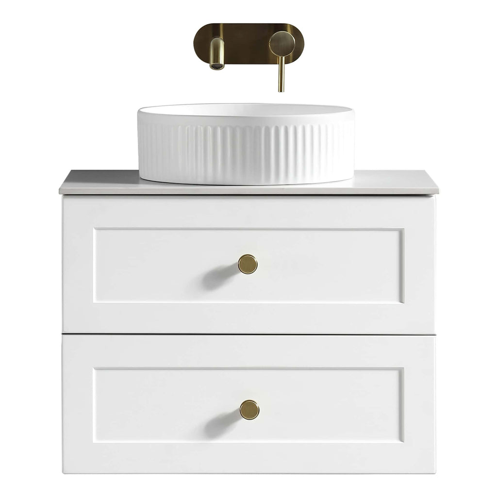 Sleek white bathroom vanity with integrated basin, modern brass fixtures, and ample storage drawers, perfect for contemporary bathroom design. Ideal for stylish bathroom upgrades.
