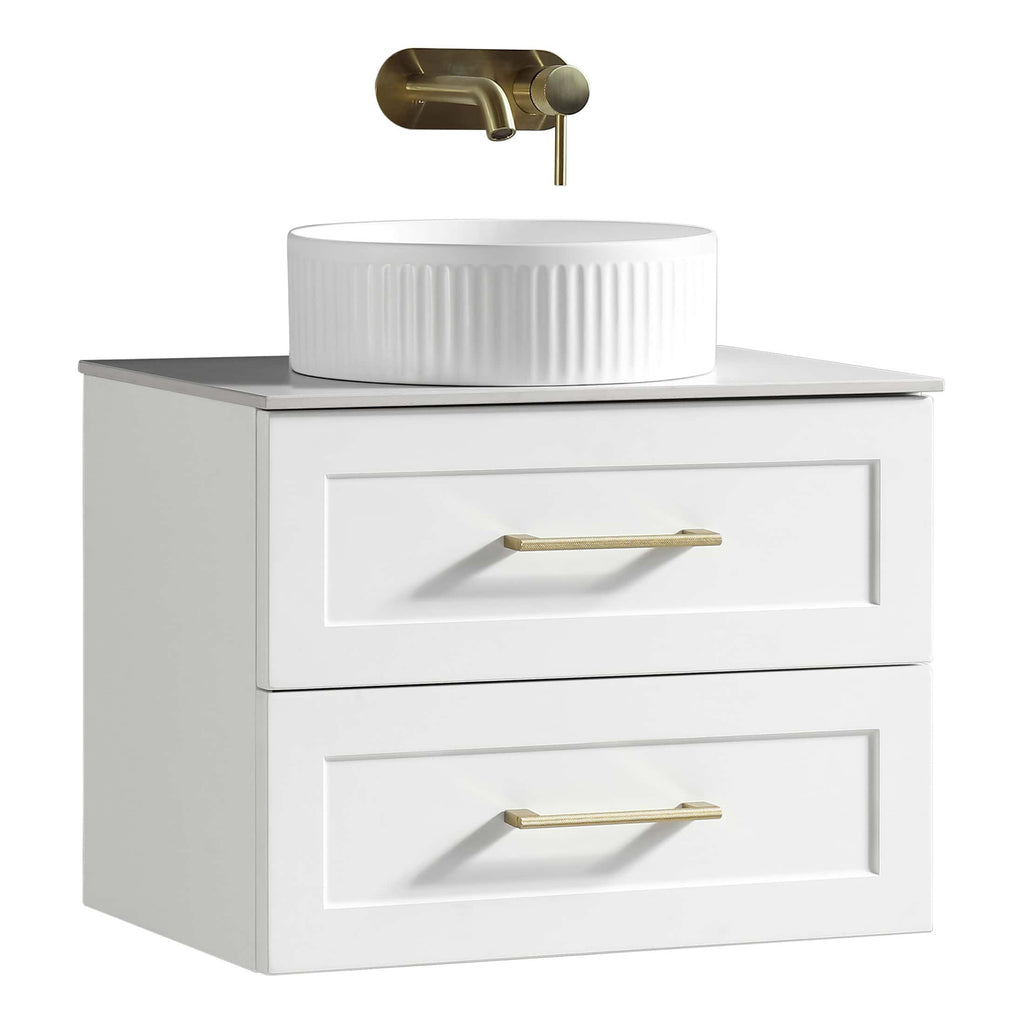 Polished white bathroom vanity with dual drawers and sleek gold handles, topped with a modern round ceramic vessel sink and wall-mounted brass faucet, perfect for contemporary bathroom decor.