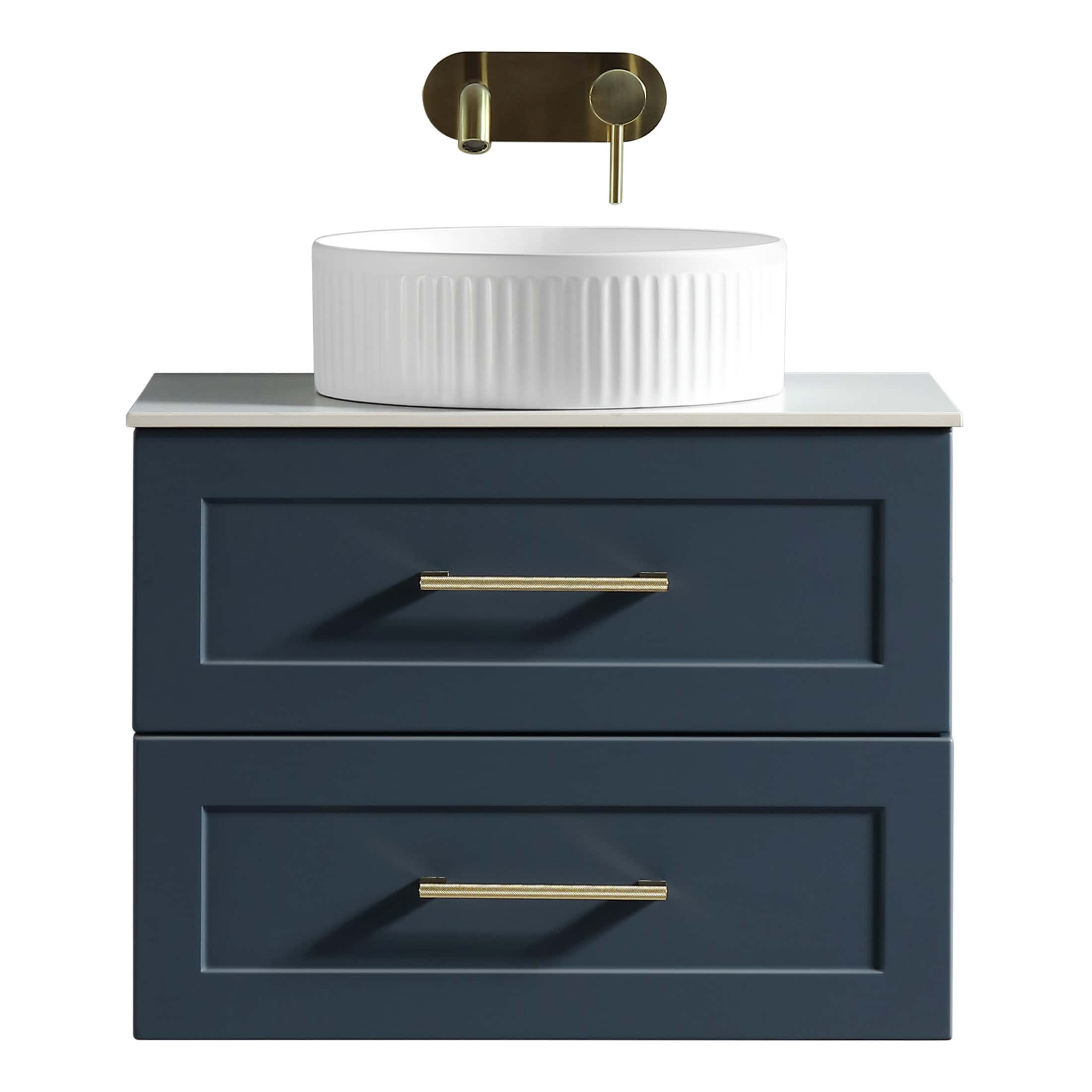 Sleek navy bathroom vanity with gold handles and a white countertop, featuring a modern oval vessel sink and gold wall-mounted faucet for contemporary bathroom decor.