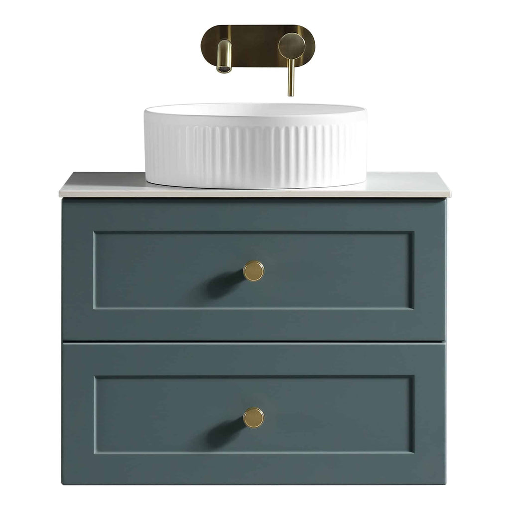 Sleek modern bathroom vanity with a white ceramic vessel sink and brass faucet, featuring a stylish blue cabinet with two drawers for bathroom storage.