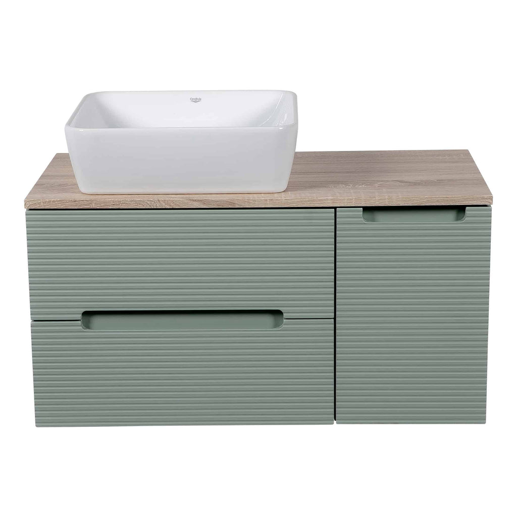 Sleek modern bathroom vanity with a wood effect countertop, mint green textured drawers, and a stylish white rectangular basin for contemporary bathroom design.