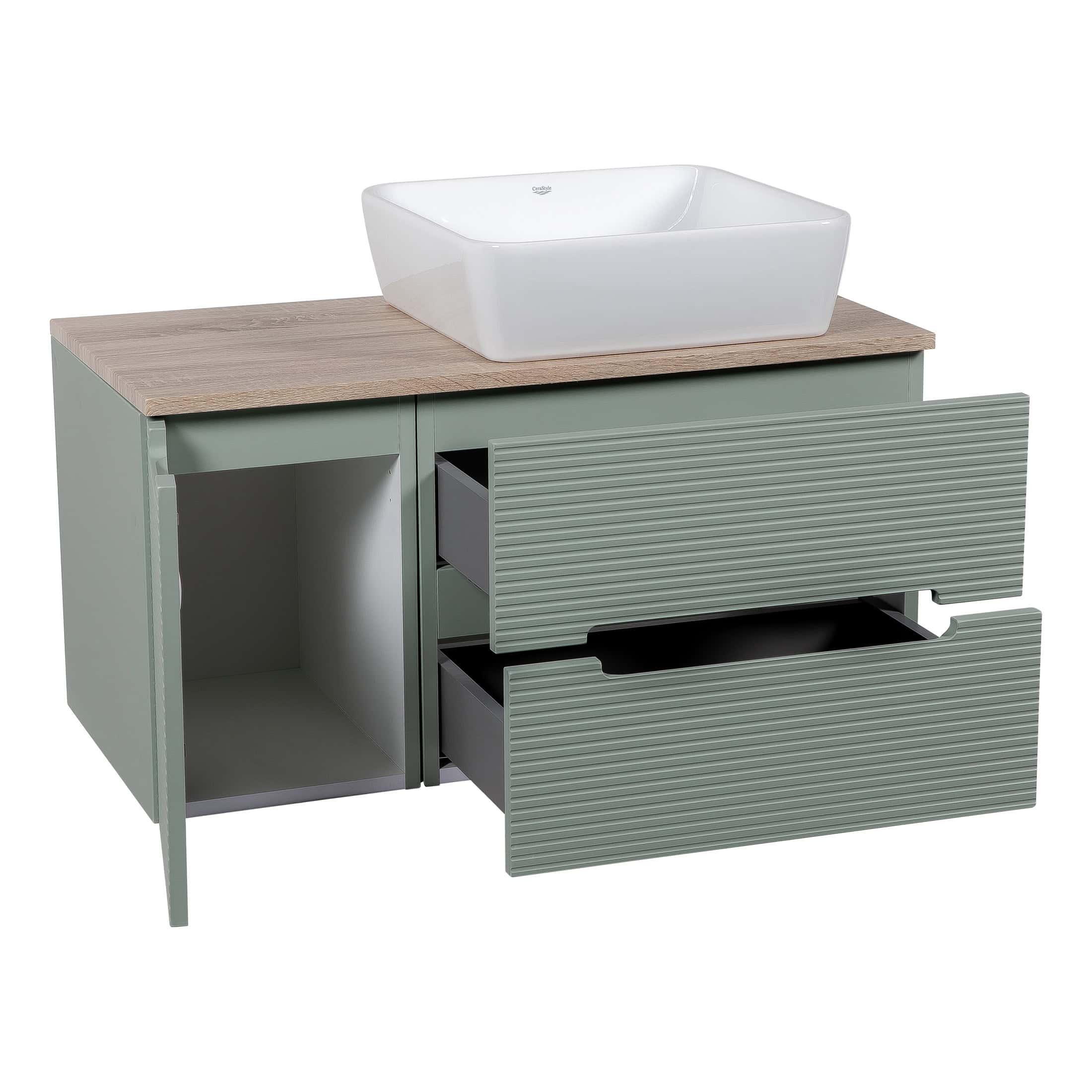 Sleek modern bathroom vanity with a light green finish, natural wood top, and a stylish rectangular white sink for contemporary bathroom design.