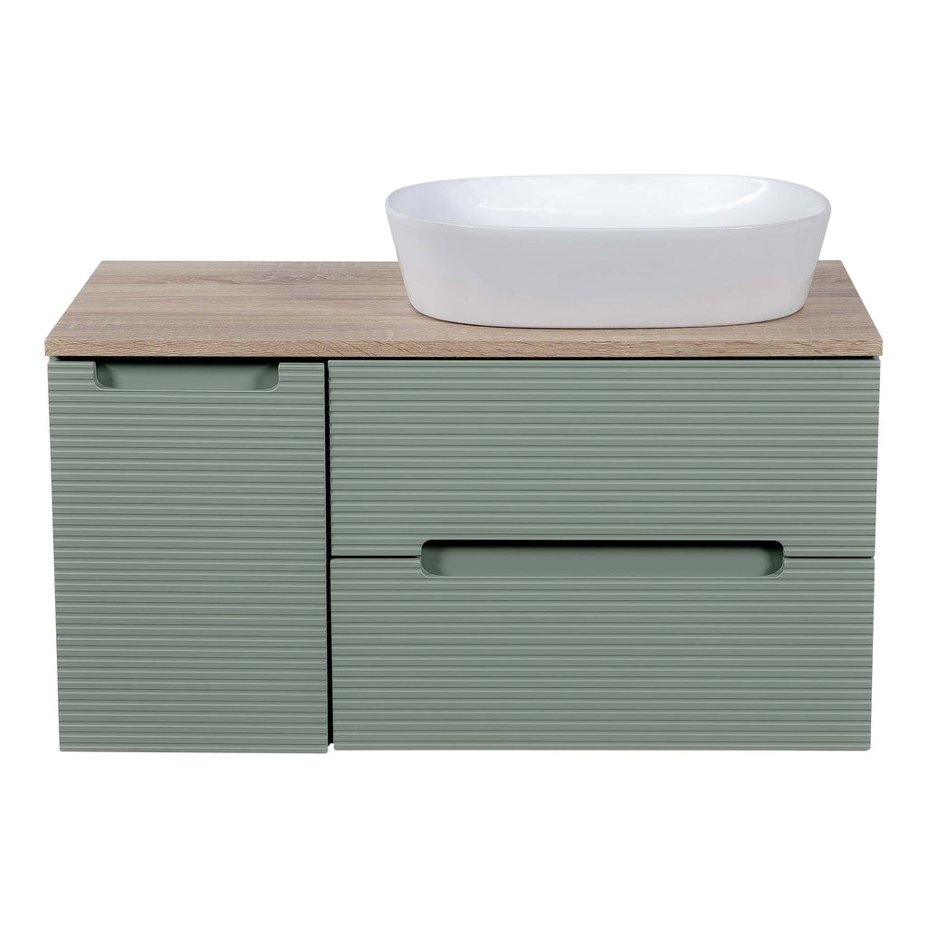 Contemporary bathroom vanity unit with a minimalist design, featuring a wooden top, sage green textured drawers, and a sleek white vessel sink, ideal for modern bathroom interiors.