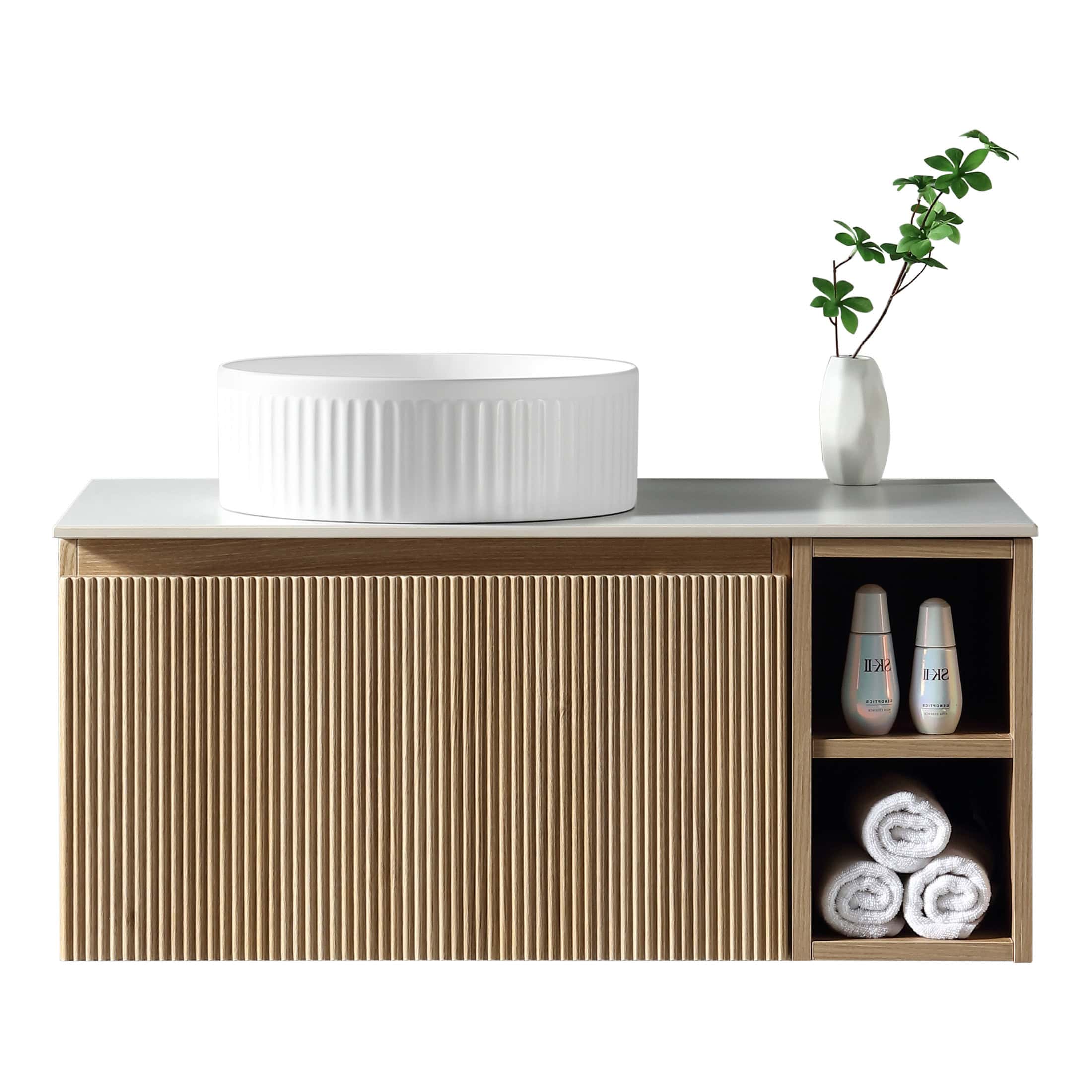 Modern bathroom vanity with rattan door, white countertop, large vessel sink, and decorative vase with greenery. Ideal for contemporary bathroom designs, combining natural wood and sleek white elements.