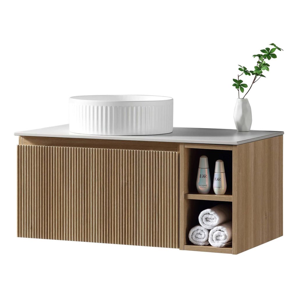 Sleek modern bathroom vanity with wood finish and ribbed cabinet door, featuring a round white vessel sink, and storage for towels and toiletries, perfect for contemporary bathroom design.