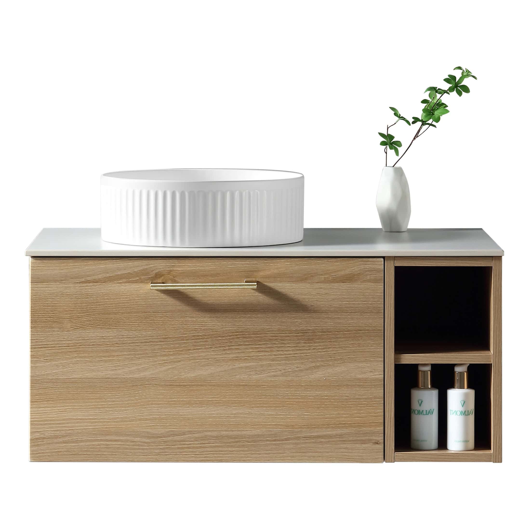 Sleek modern bathroom vanity with a wooden finish, integrated storage and a stylish countertop basin, complemented by decorative accessories for a contemporary bathroom design.