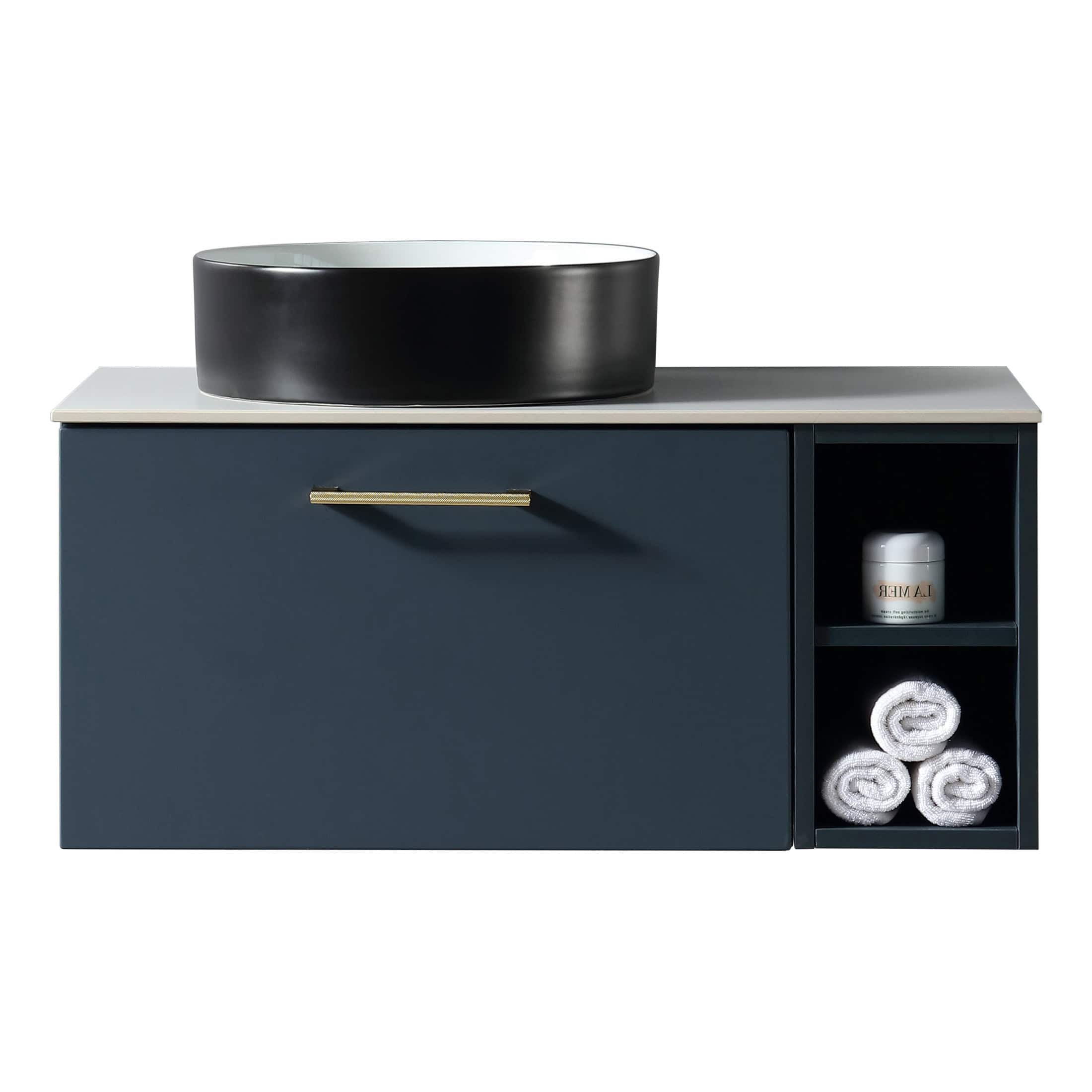 Black oval bathroom sink on dark blue vanity unit with storage shelves filled with white towels and toiletries, modern bathroom furniture, sleek design, bathroom vanity ideas, elegant bathroom decor.