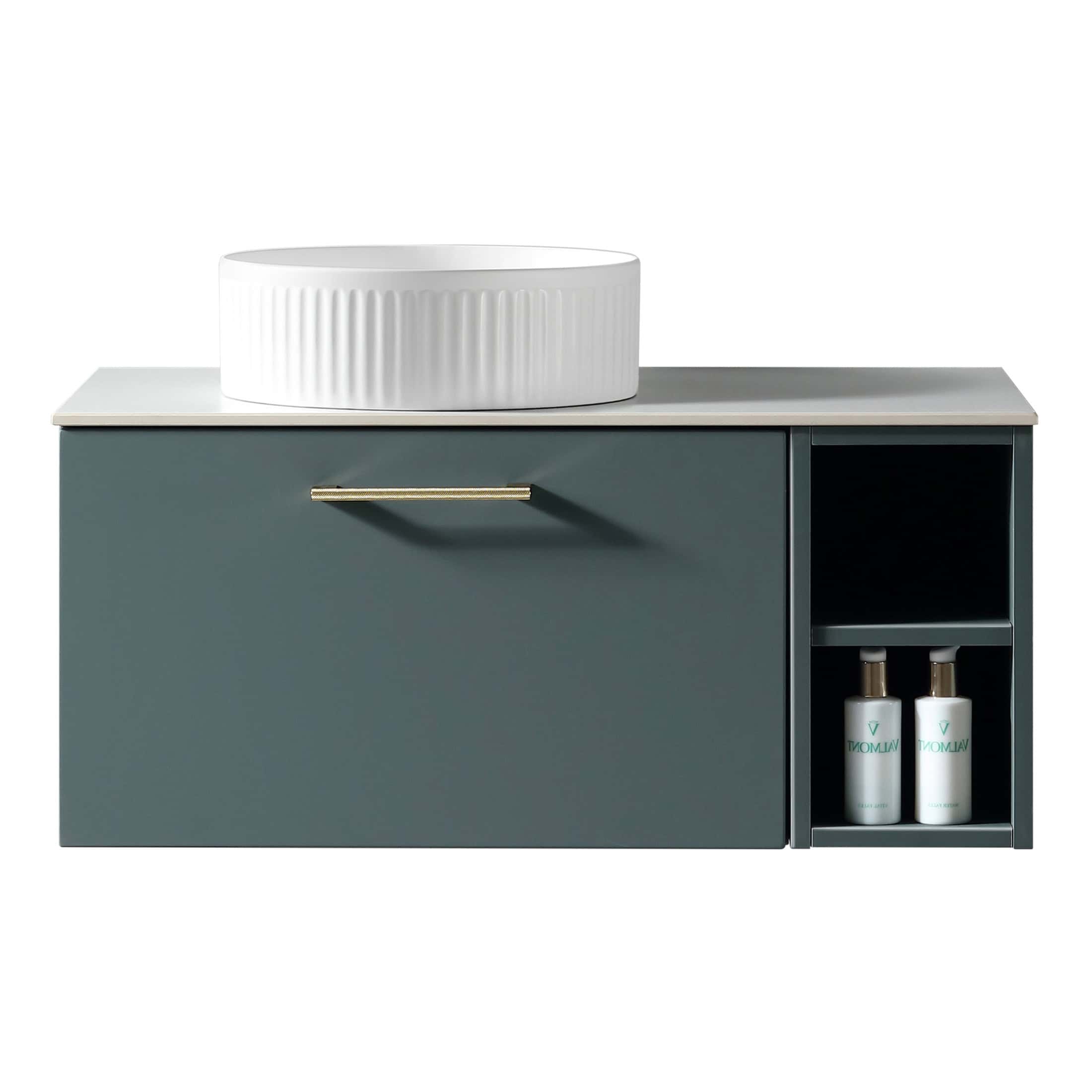Luxurious modern bathroom vanity with a sleek green finish, spacious drawer, and open shelving for toiletries, featuring a stylish round white vessel sink for contemporary bathroom design.