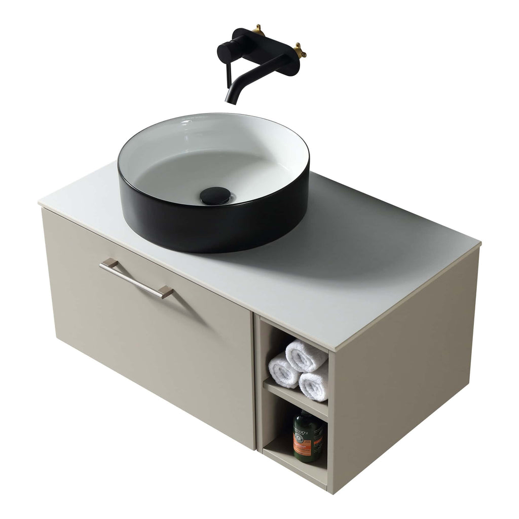 Modern ceramic bathroom sink with a sleek black and white design on a contemporary vanity unit, ideal for stylish and functional bathroom spaces.