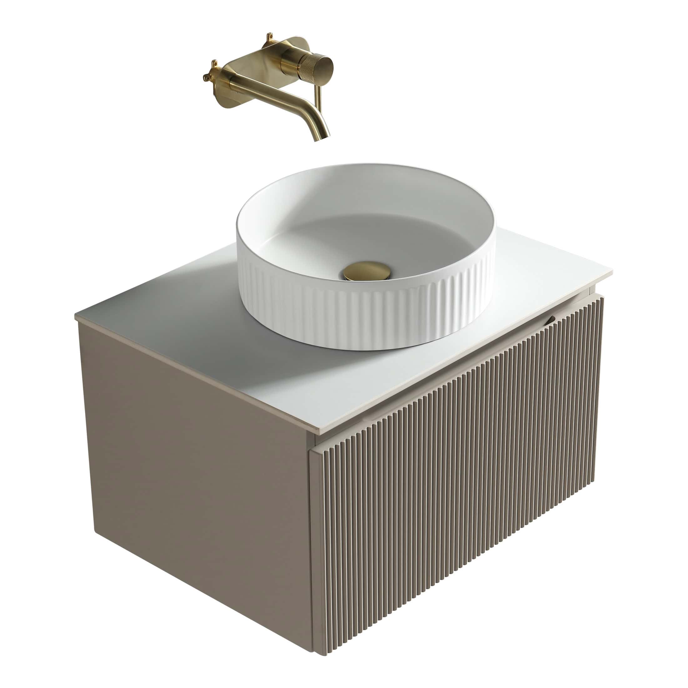 Polished brass bathroom tap and modern white ceramic vessel sink on stylish beige vanity unit, ideal for contemporary bathroom design.