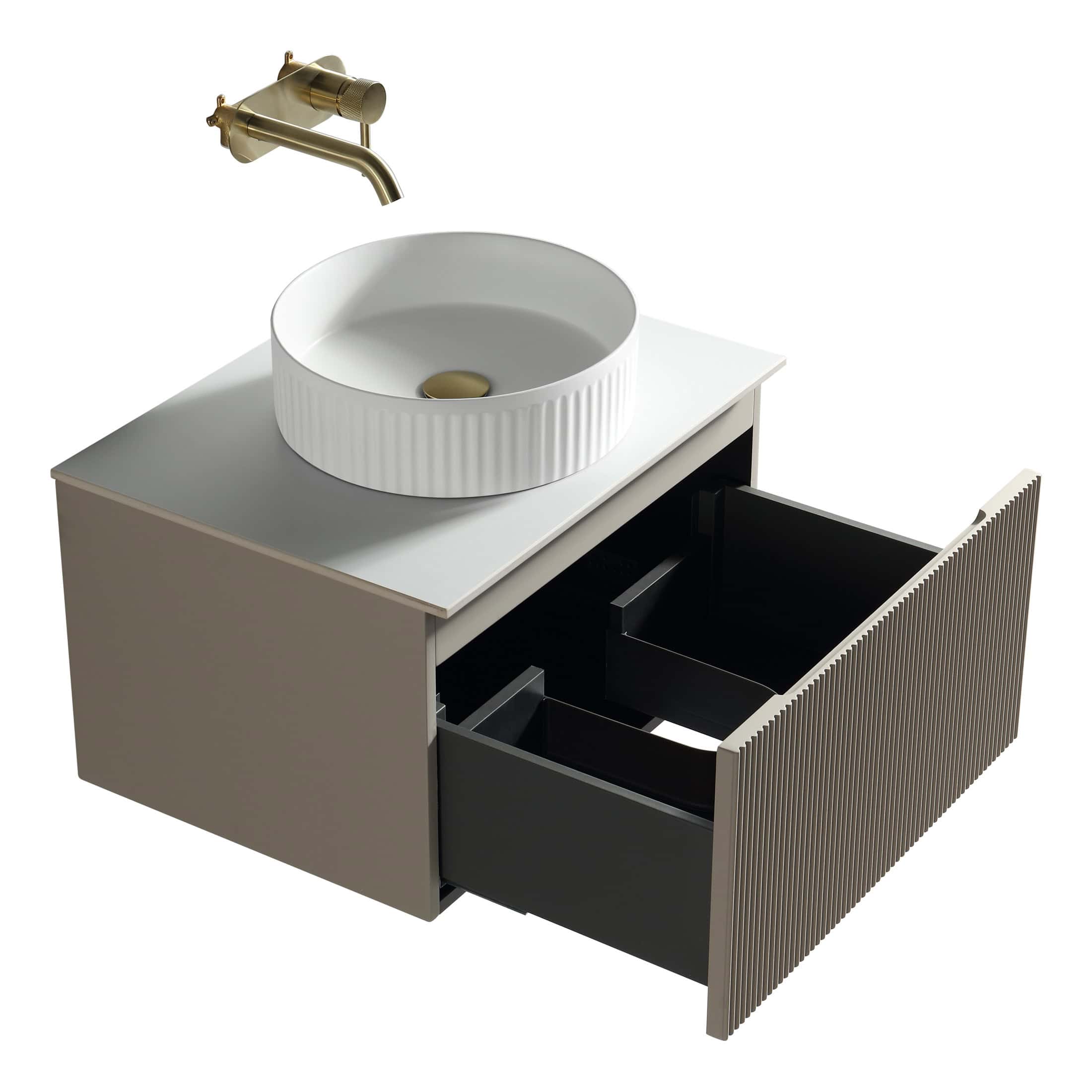 Modern bathroom vanity with a stylish vessel sink and sleek gold fixtures, ideal for contemporary bathroom designs.