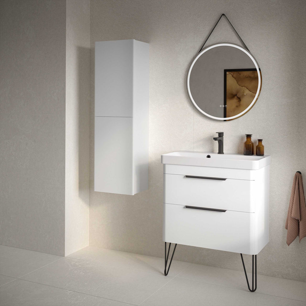 Elegant modern bathroom vanity with sleek black handles and a slim black faucet in a neutral-toned bathroom setting.