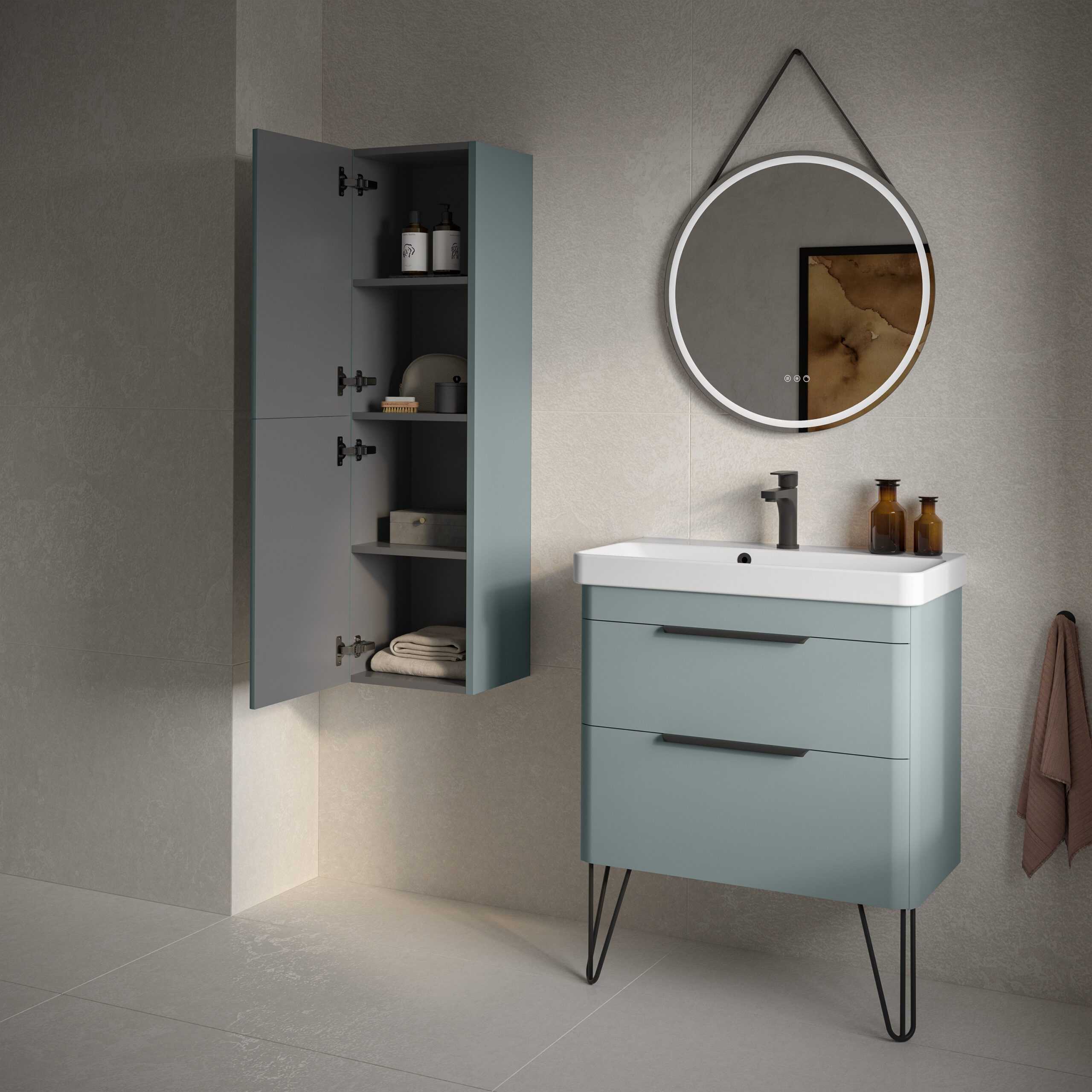 Sleek modern bathroom vanity with a matching wall-mounted storage cabinet in soft blue, featuring minimalist design, black fixtures, and stylish accessories for a contemporary bathroom look.