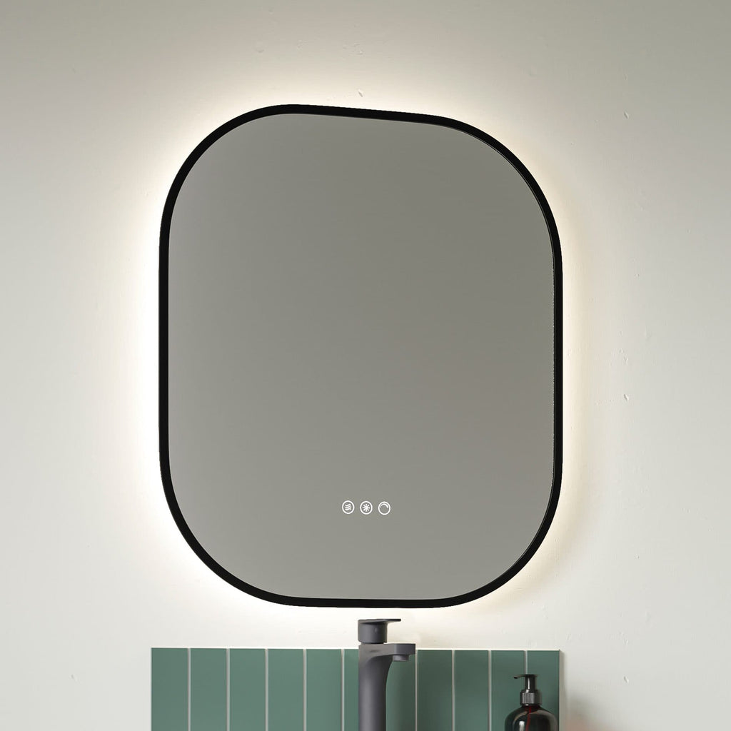 Sleek backlit bathroom mirror with touch controls, illuminated LED outline, and modern design, perfect for contemporary bathroom decor.
