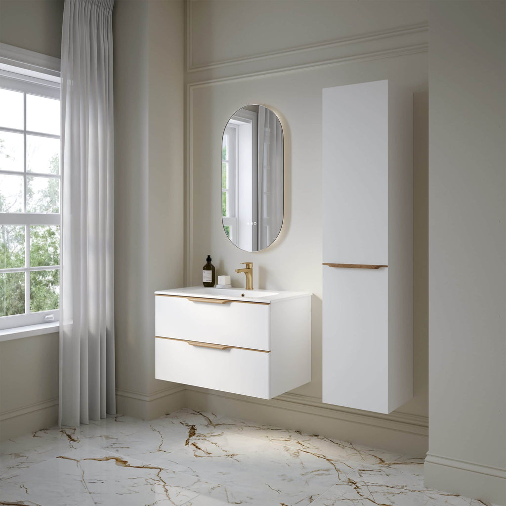 Sleek white bathroom vanity with gold accents in a modern, elegant bathroom interior featuring a tall storage cabinet, oval mirror, and marble flooring. Perfect for contemporary bathroom design.