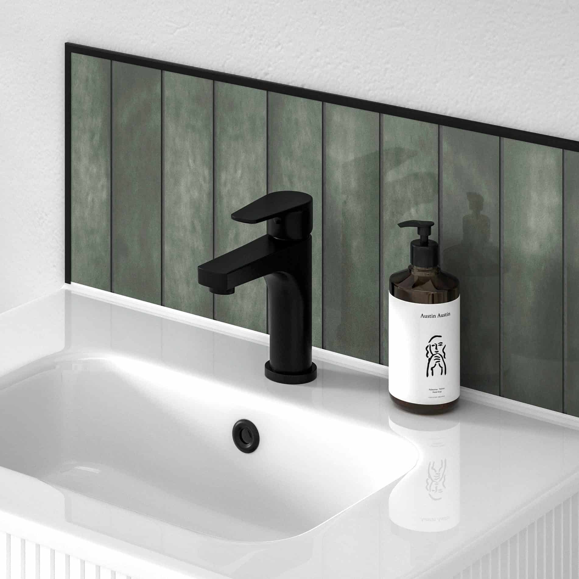 Sleek black bathroom tap with matching soap dispenser on a white sink, featuring a green tiled backsplash for modern bathroom decor.