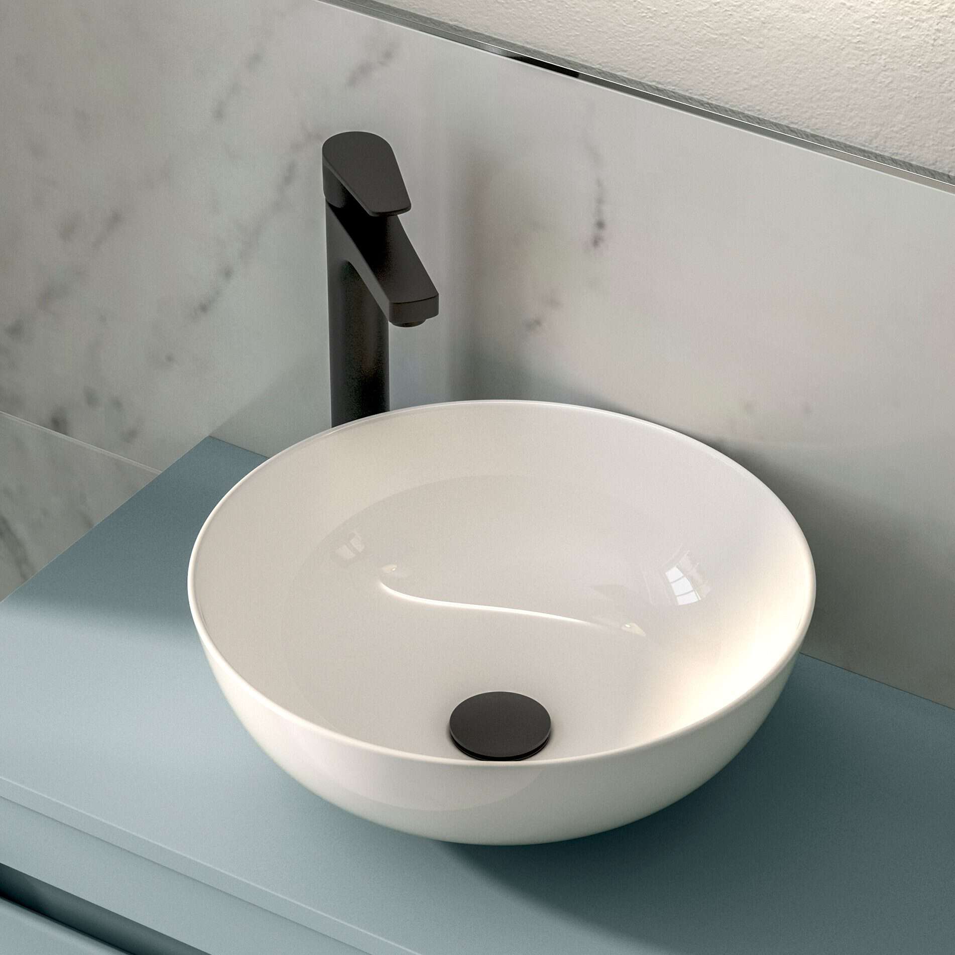 Modern white bathroom basin with black tap and pop-up plug for contemporary bathroom design, showcasing sleek and minimalist aesthetics.