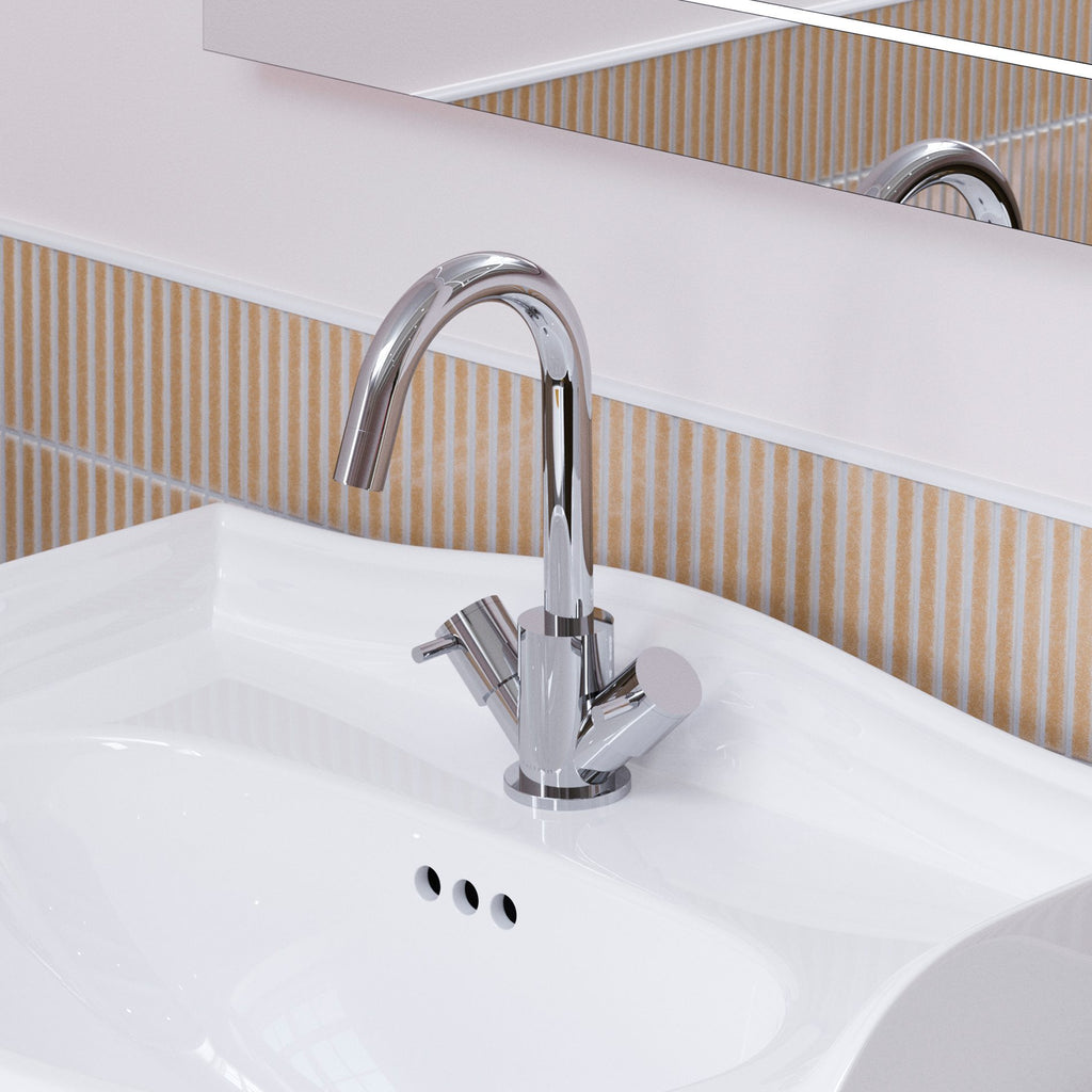 Shiny chrome bathroom sink faucet with modern design, mounted on white ceramic basin, complemented by beige striped tile wall and large mirror for contemporary bathroom decor.