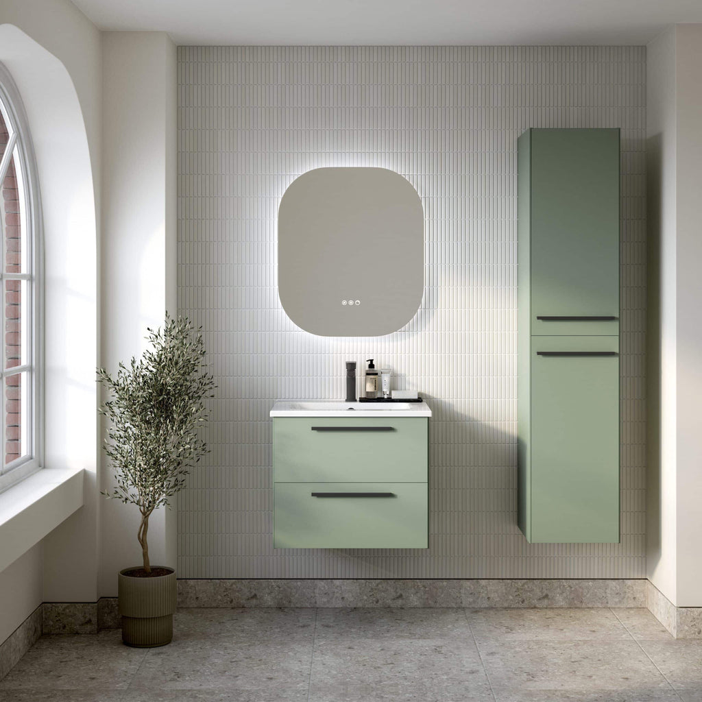 Sleek modern bathroom vanity with green cabinetry, wall-mounted mirror with LED lighting, and tall storage cabinet, surrounded by minimalist design elements and natural light for a contemporary bathroom look.