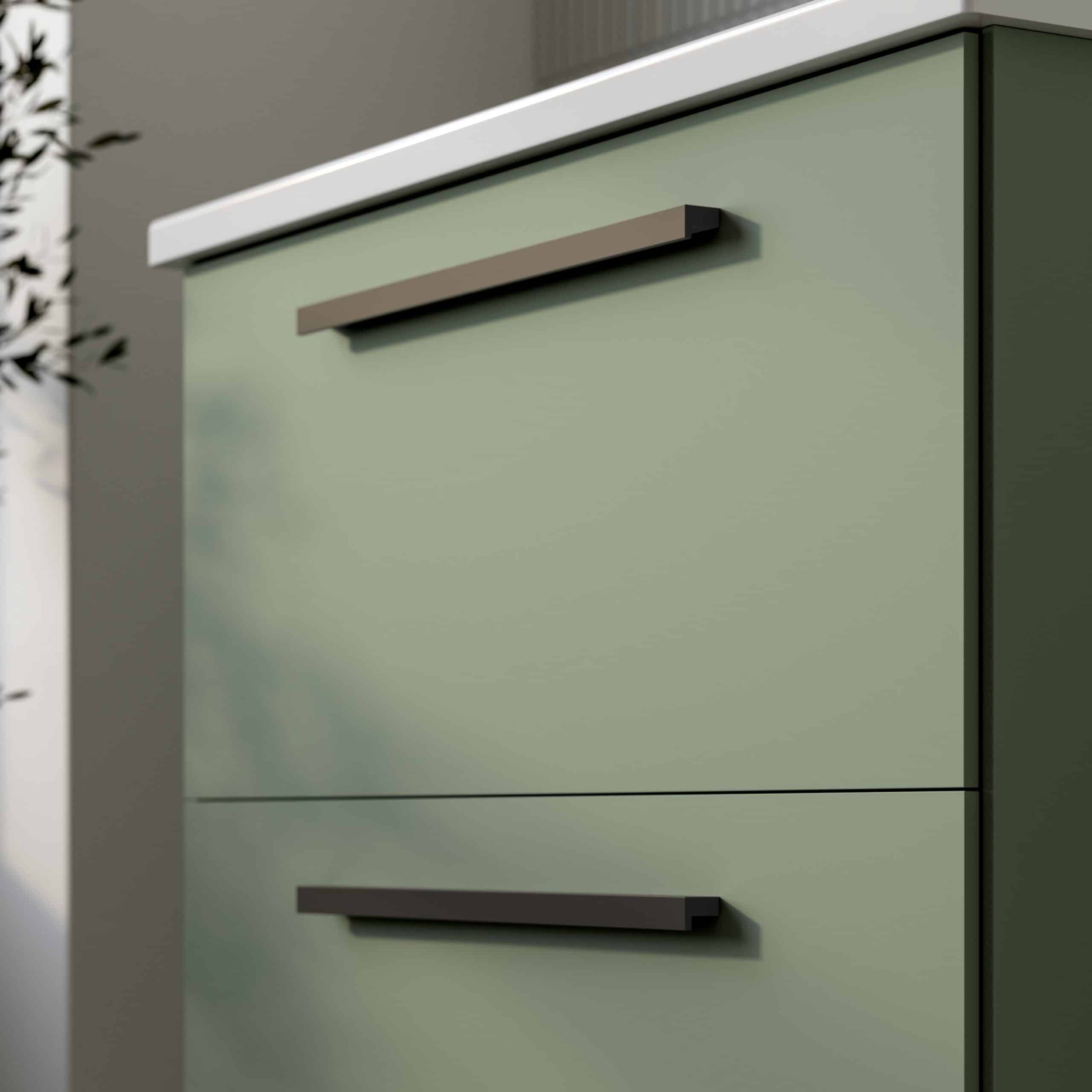 Contemporary green bathroom cabinet with sleek black handles, modern minimalist design, perfect for stylish bathroom storage solutions.