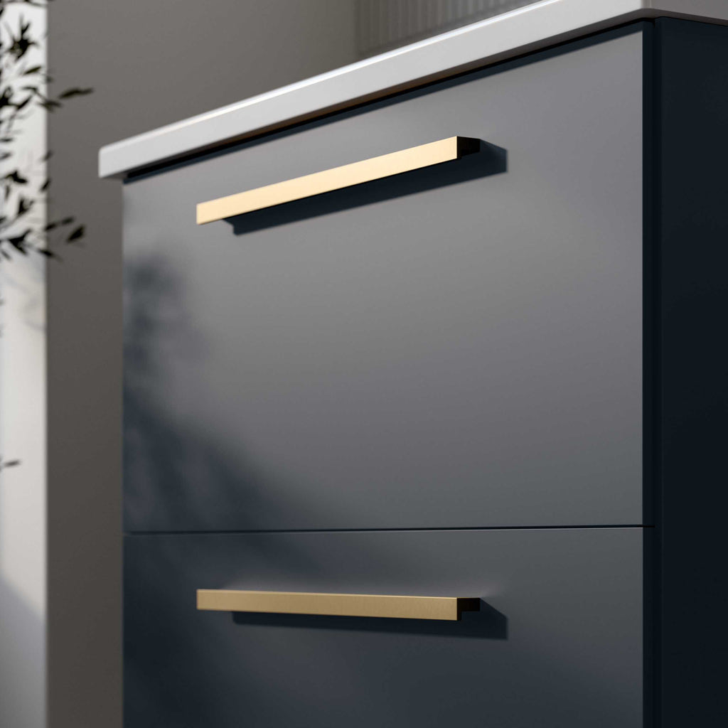 Sleek modern bathroom cabinet with gold handles in a stylish grey finish, perfect for contemporary bathroom storage and aesthetics.