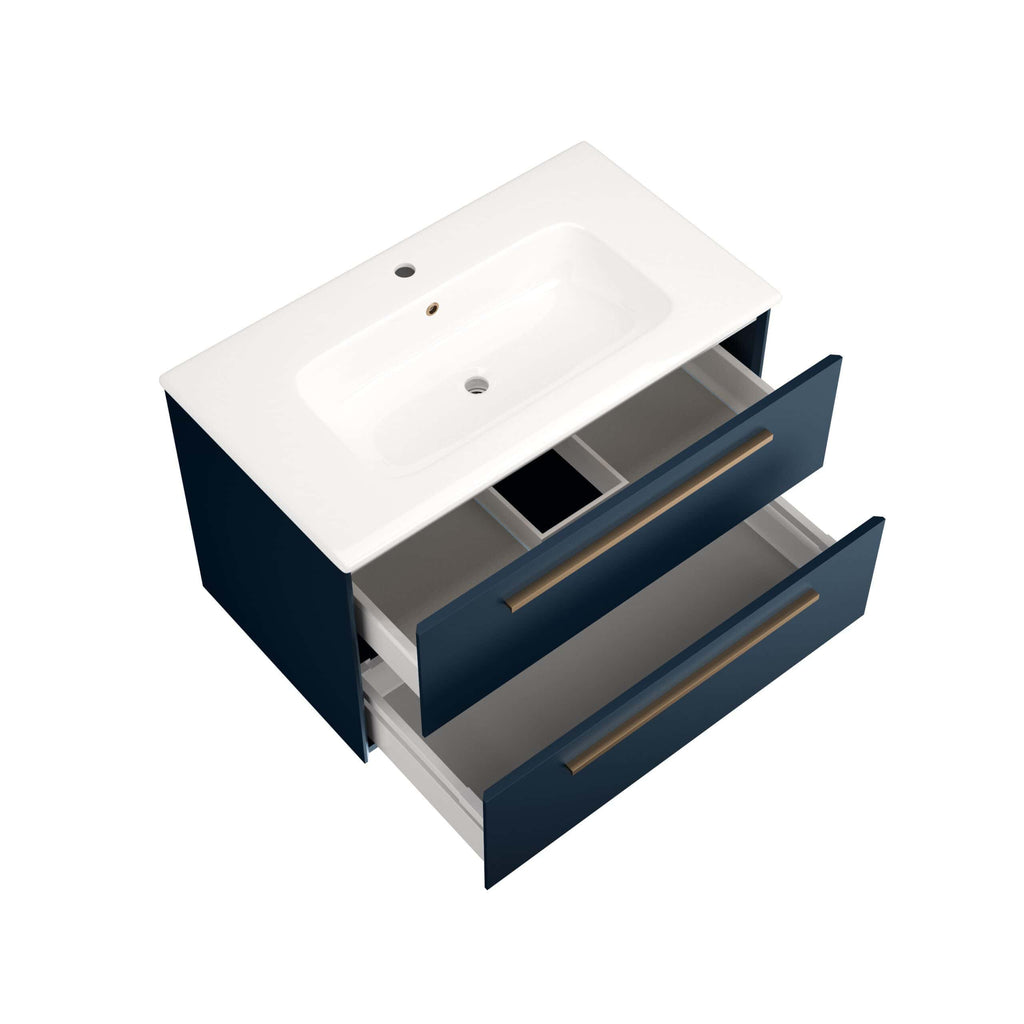 Modern bathroom vanity with a white ceramic sink and navy blue drawers, featuring sleek aluminium handles for stylish bathroom storage and plumbing.