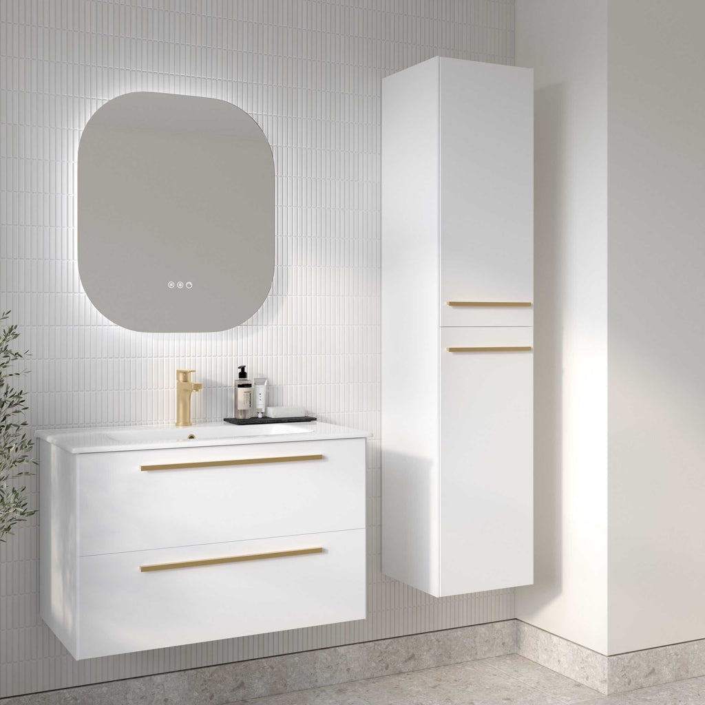Sleek white bathroom vanity with gold handles and matching wall-mounted cabinet in modern bathroom design. Features a stylish mirror and contemporary accessories, perfect for a minimalist bathroom space.