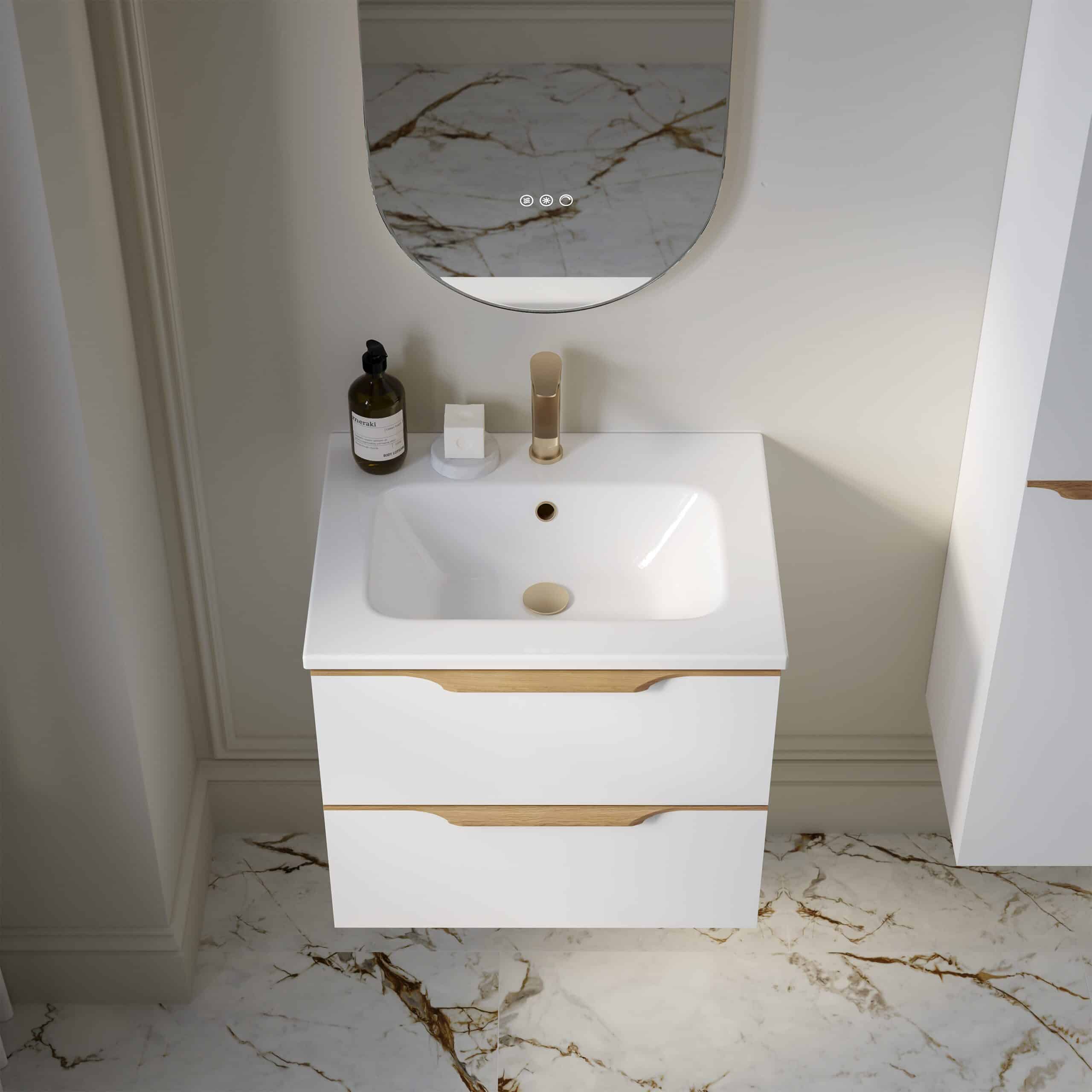 Modern white bathroom vanity with sleek wooden accents and marble flooring, featuring contemporary fixtures and minimalistic design for elegant bathroom renovation.
