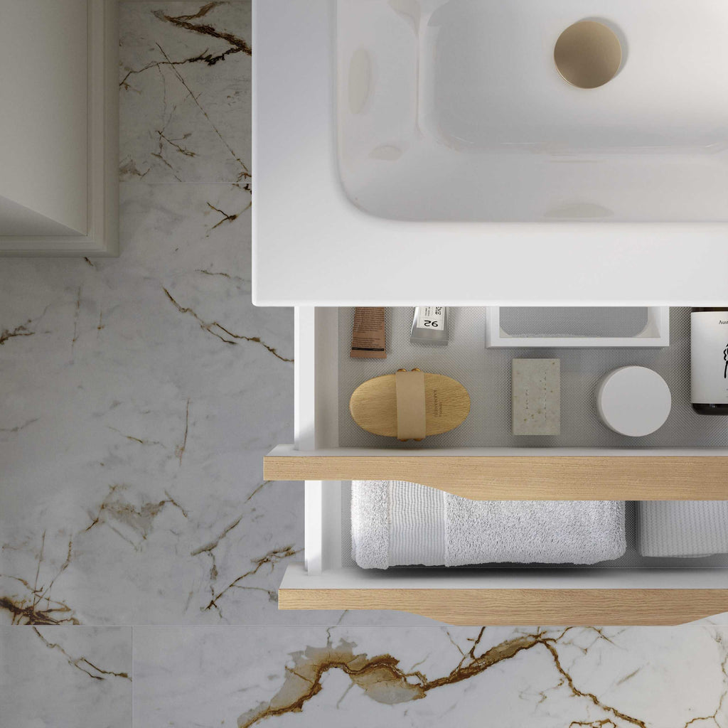Luxe bathroom vanity drawer with marble countertop, neatly organized with toiletries and towels, showcasing sleek design and modern bathroom storage solutions.
