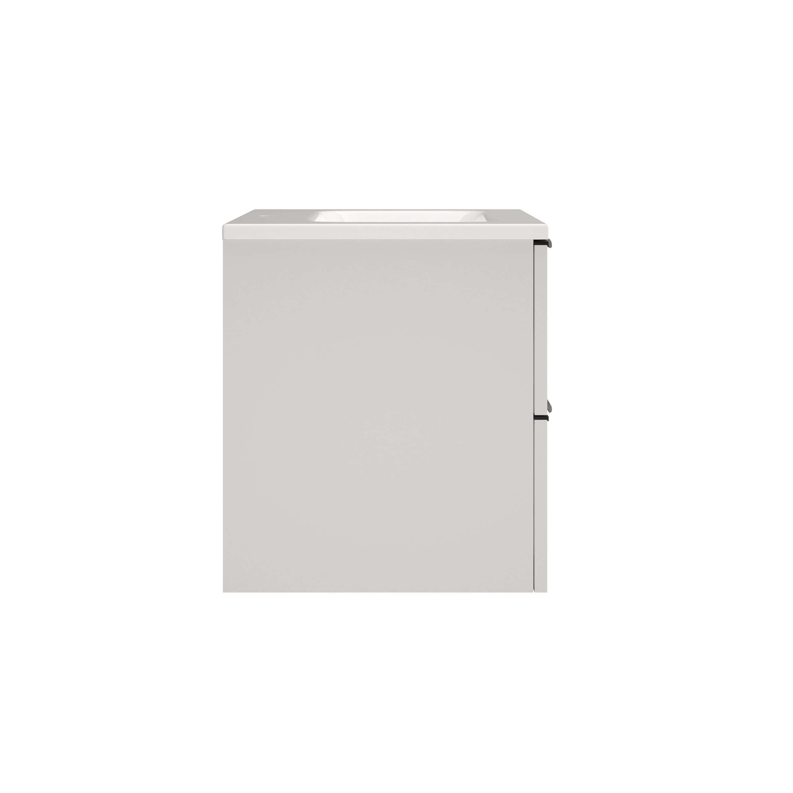 White bathroom vanity with integrated sink, compact design, ideal for modern bathroom interiors, featuring storage cabinet, high-quality finish, and sleek minimalist style.