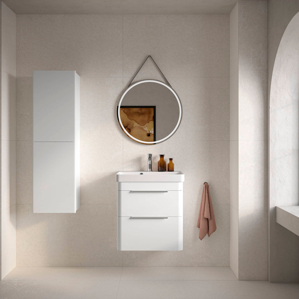 Sleek modern white bathroom vanity with integrated sink and round mirror, minimalist bathroom decor with neutral tones, perfect for contemporary bathroom design.