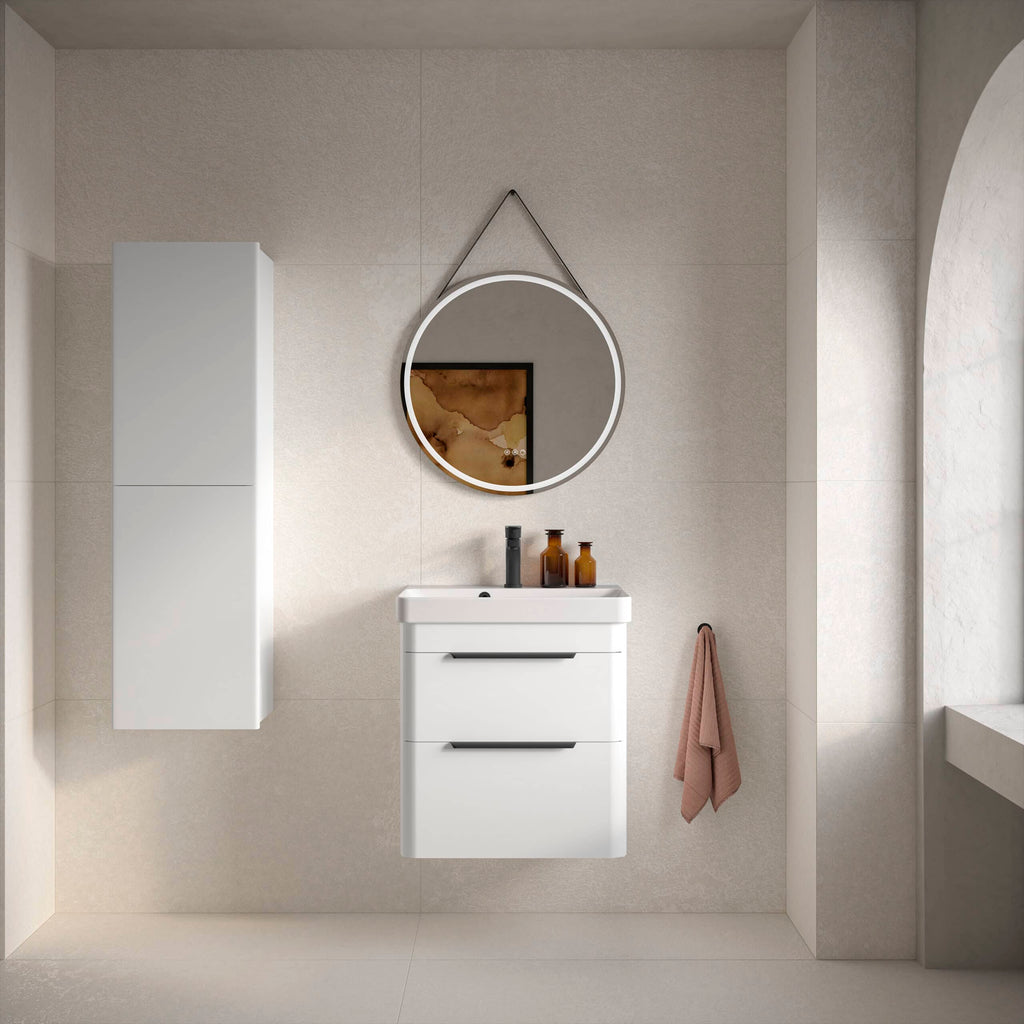 Contemporary white bathroom vanity with integrated sink, modern black fixtures, and minimalist decor in a stylish neutral-toned bathroom.