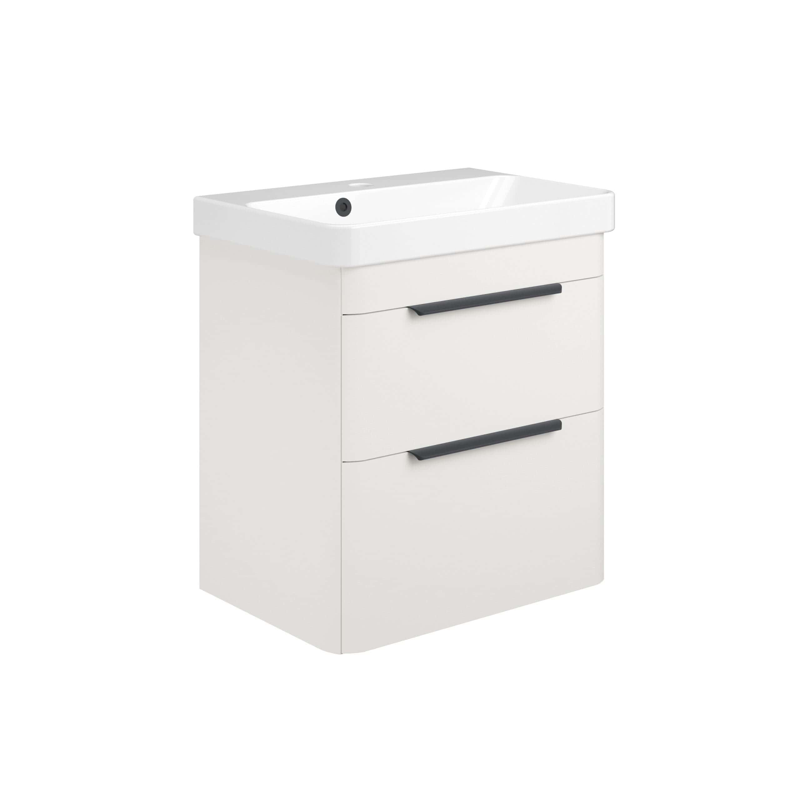 Modern white bathroom vanity unit with integrated sink, black handles, ideal for contemporary bathroom design, providing stylish storage and functionality.