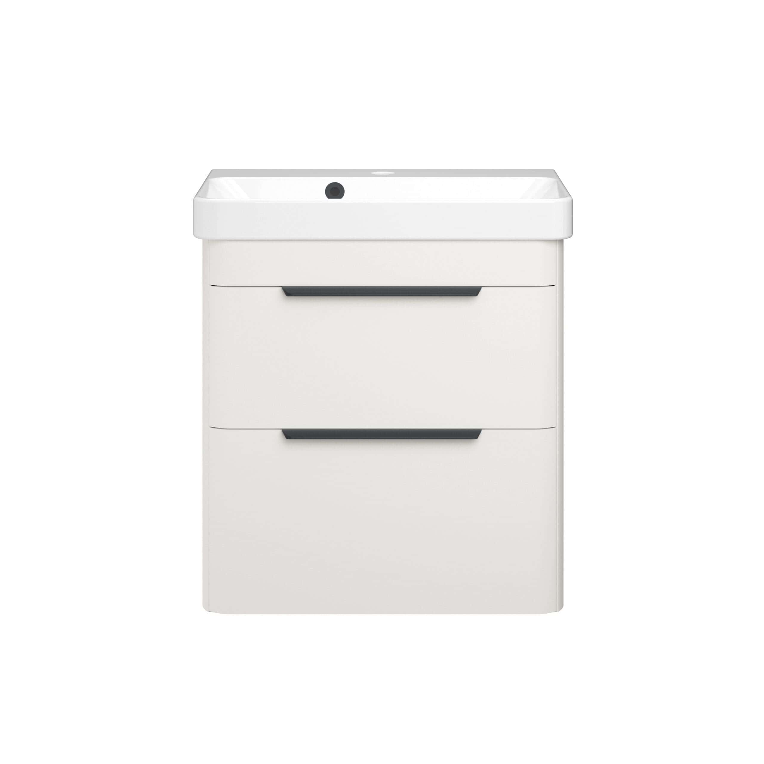 Sleek white bathroom vanity with integrated washbasin and modern black handle accents, ideal for contemporary bathroom designs and maximising space. Perfect for stylish bathroom furniture solutions.