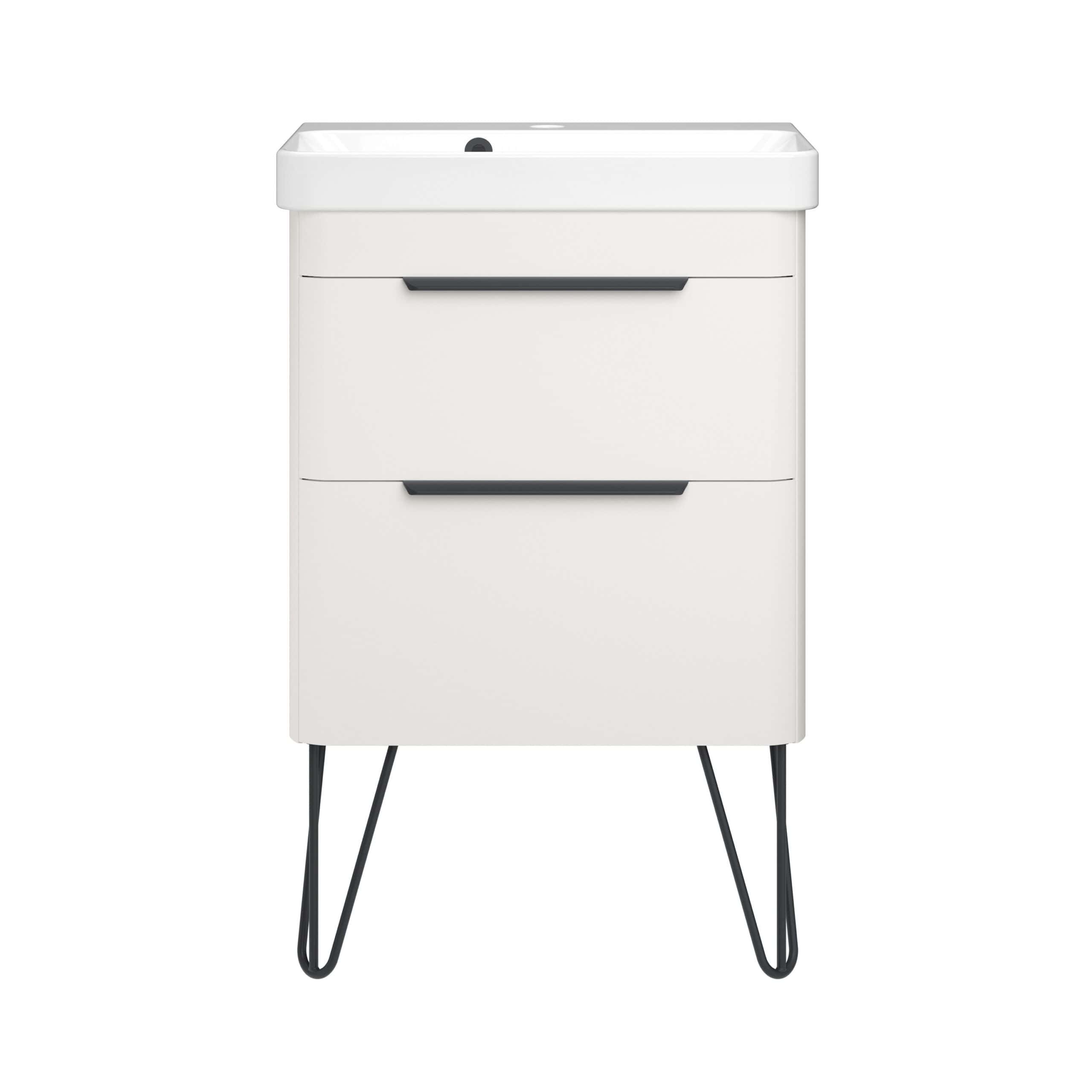 Modern white bathroom vanity with sleek black handles and angled black metal legs, designed for contemporary bathroom storage and style.