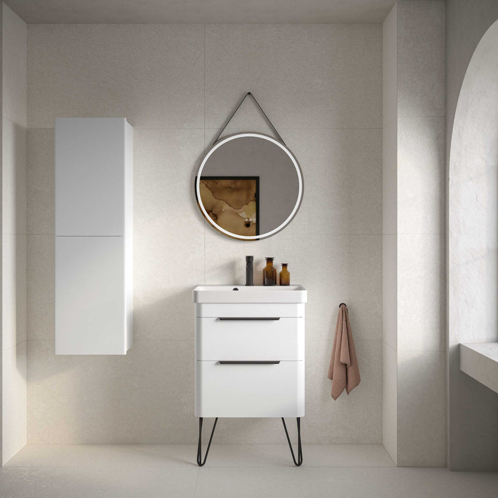 Sleek modern bathroom vanity with circular mirror, styled with minimalist decor, natural colour palette, and contemporary fixtures for a luxurious bathroom look.