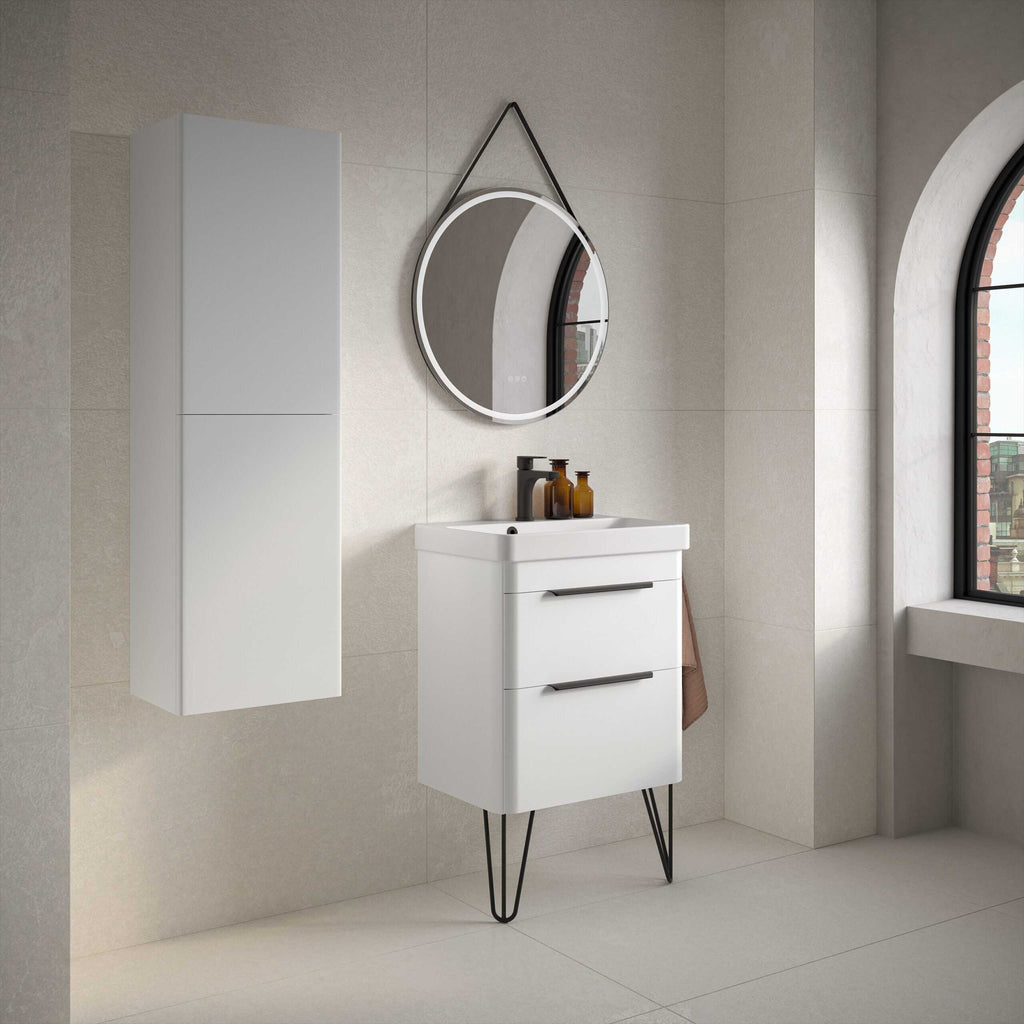 Sleek modern bathroom vanity and mirror with black accents, minimalist design, neutral colour palette, natural light, stylish bathroom decor, contemporary bathroom furniture, urban bathroom style, black hairpin legs, spacious bathroom decor, clean white finishes, elegant bathroom storage, bathroom interior design, bathroom fixtures, bathroom accessories, bathroom renovation.