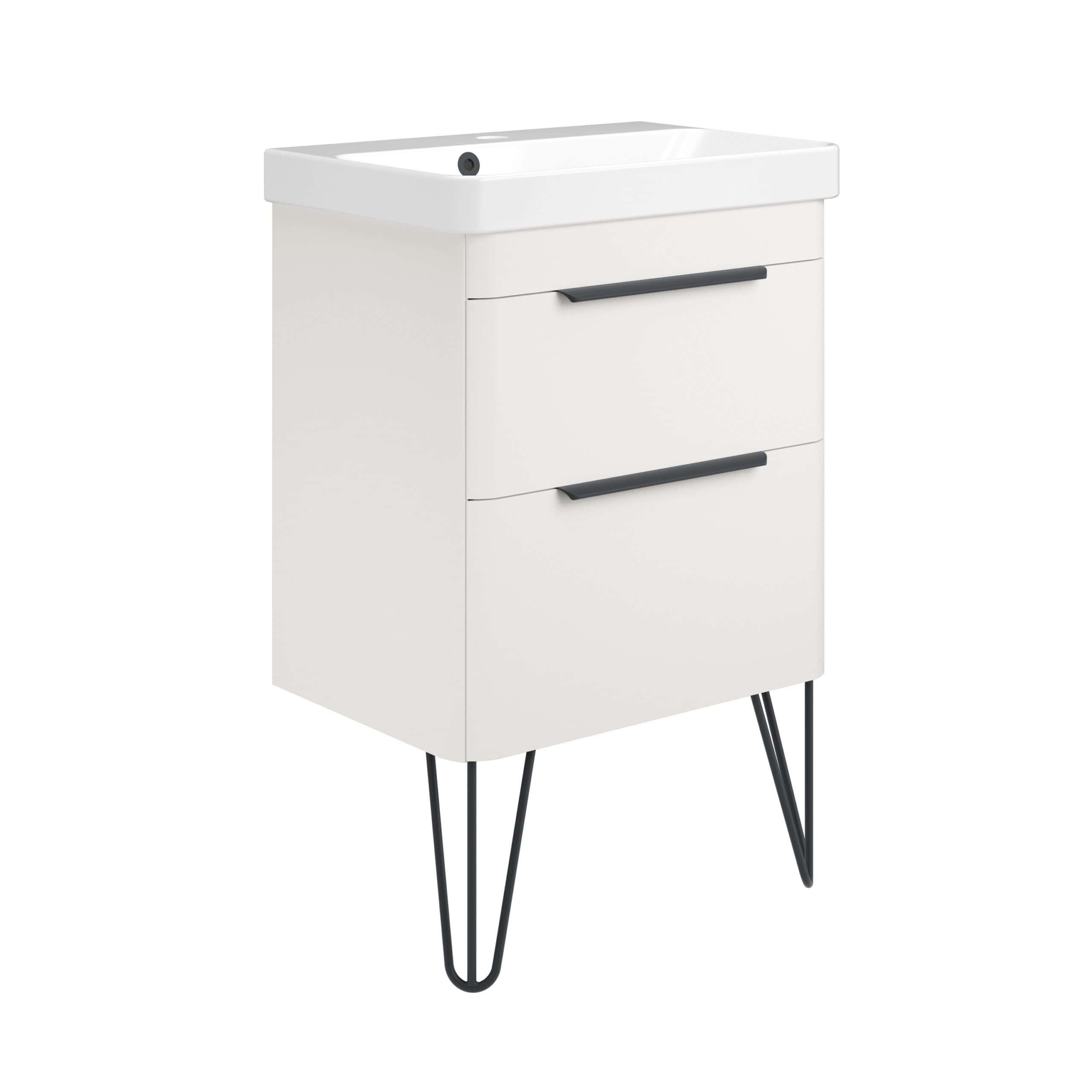 Modern white bathroom vanity with black handles and hairpin legs, ideal for contemporary bathroom design. Features storage drawers and a compact basin for efficient space utilisation.