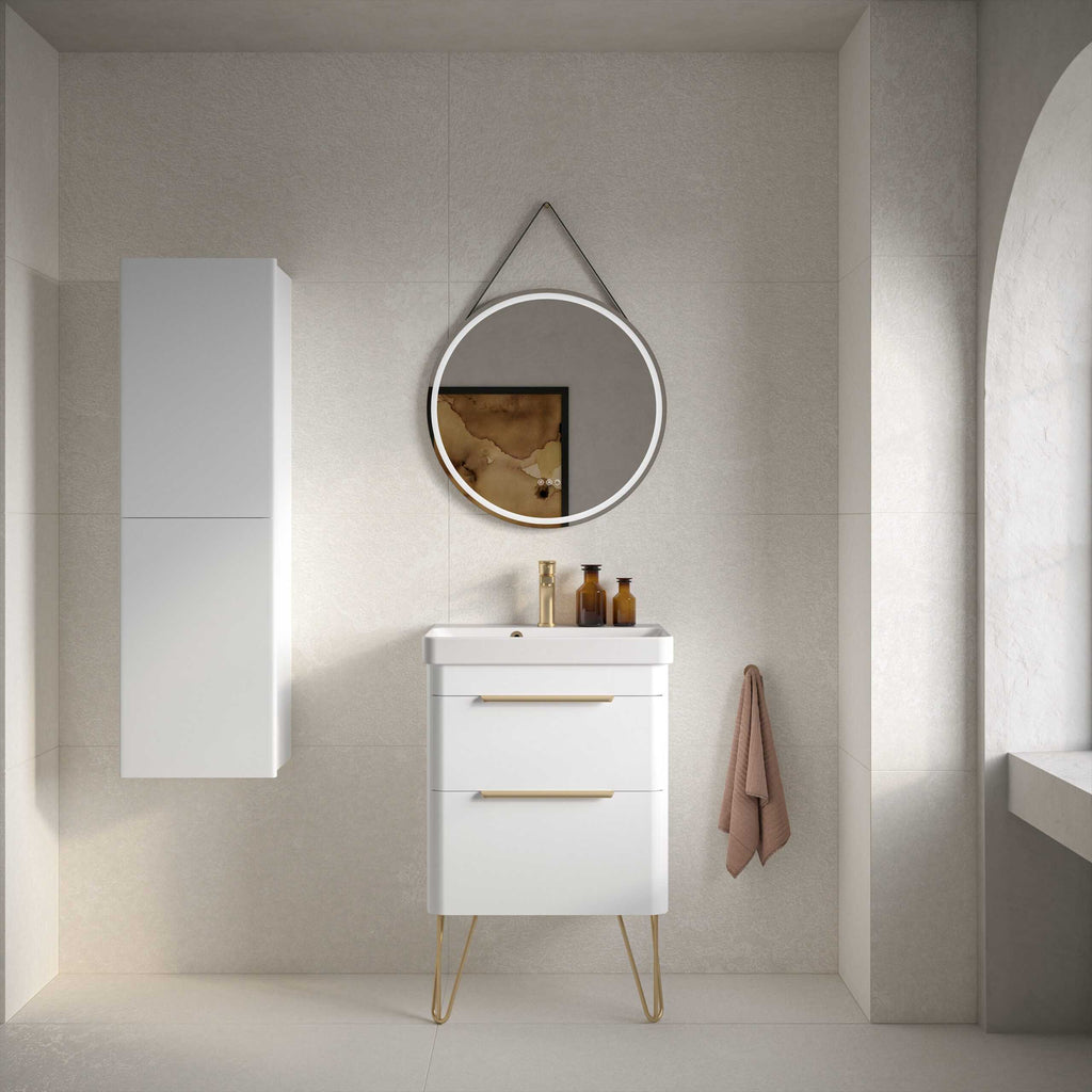 Sleek modern bathroom vanity with round mirror and minimalist design, featuring neutral tones and gold accents, perfect for contemporary bathroom remodels.