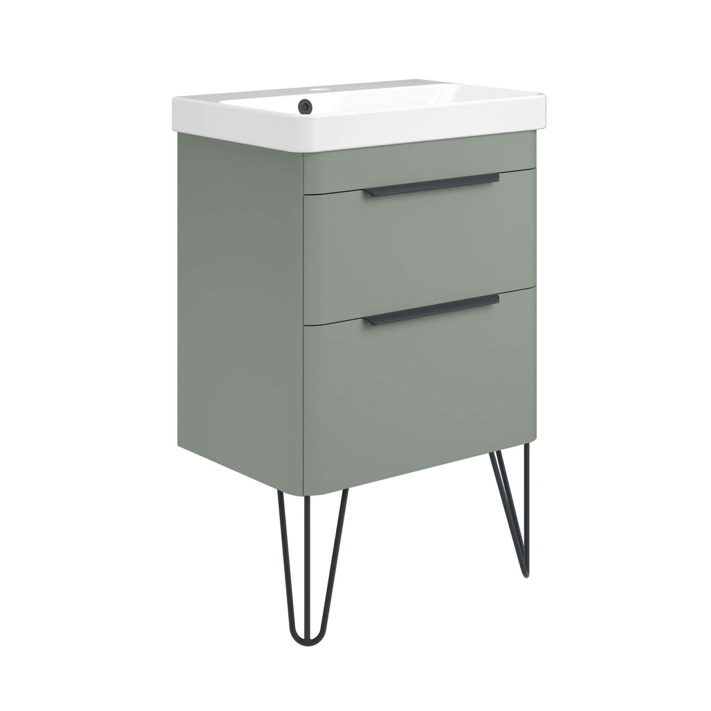 Modern grey bathroom vanity unit with integrated washbasin, sleek black handles, and hairpin legs, combining contemporary design with practical storage space.