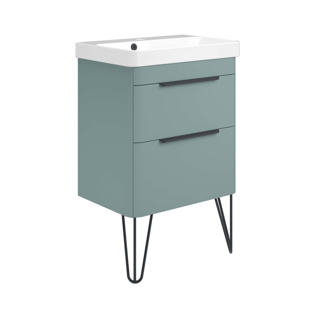 Vintage-style bathroom vanity with storage drawers and mid-century hairpin legs. Perfect for modern or retro bathroom decor, combining functionality with stylish design.