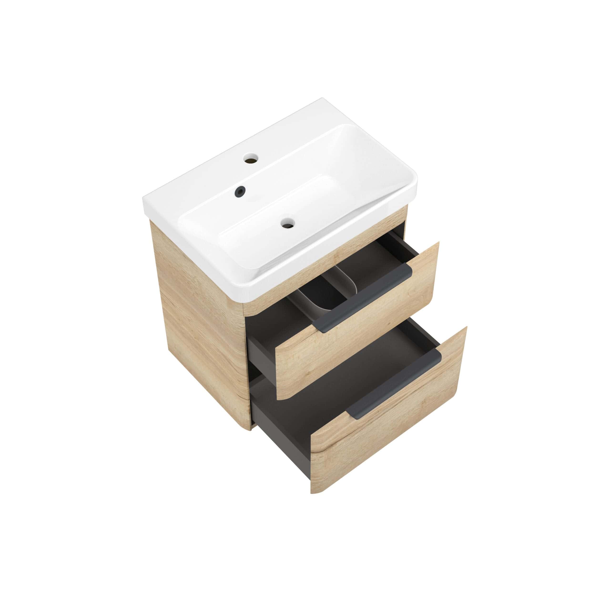 Modern bathroom vanity unit with white ceramic sink, light wood finish and black drawer handles, ideal for contemporary bathrooms and storage solutions.