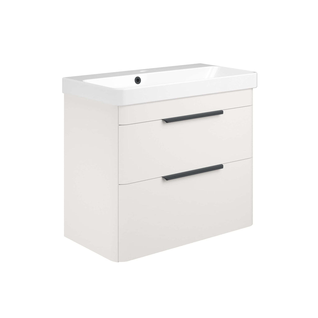 Modern white bathroom vanity with integrated sink, minimalistic black handles, and two spacious drawers for bathroom storage and organisation. Perfect for contemporary bathroom designs.