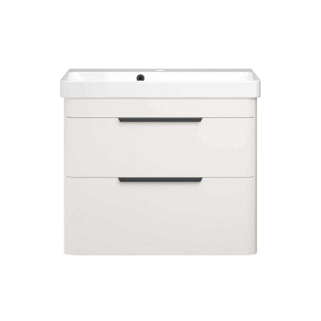 Modern white bathroom vanity with integrated sink and black handle accents for contemporary bathroom decor.