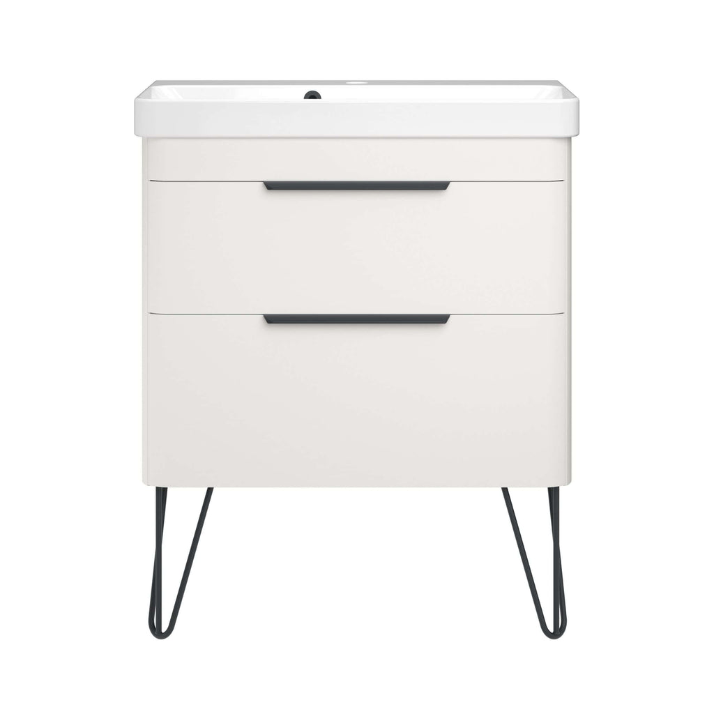 Sleek white bathroom vanity with black handles and hairpin legs, featuring ample storage drawers and a modern ceramic sink, ideal for contemporary bathroom designs.
