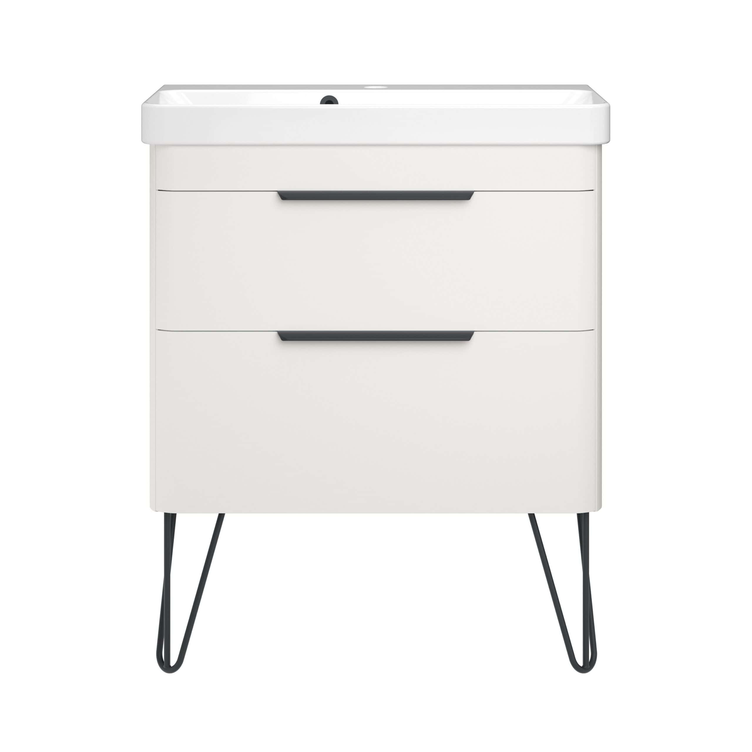 Sleek white bathroom vanity with black handles and hairpin legs, featuring ample storage drawers and a modern ceramic sink, ideal for contemporary bathroom designs.