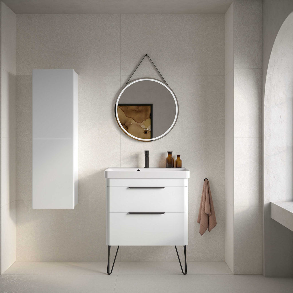 Sleek modern bathroom vanity with a mirror and stylish accessories in a contemporary bathroom setting.