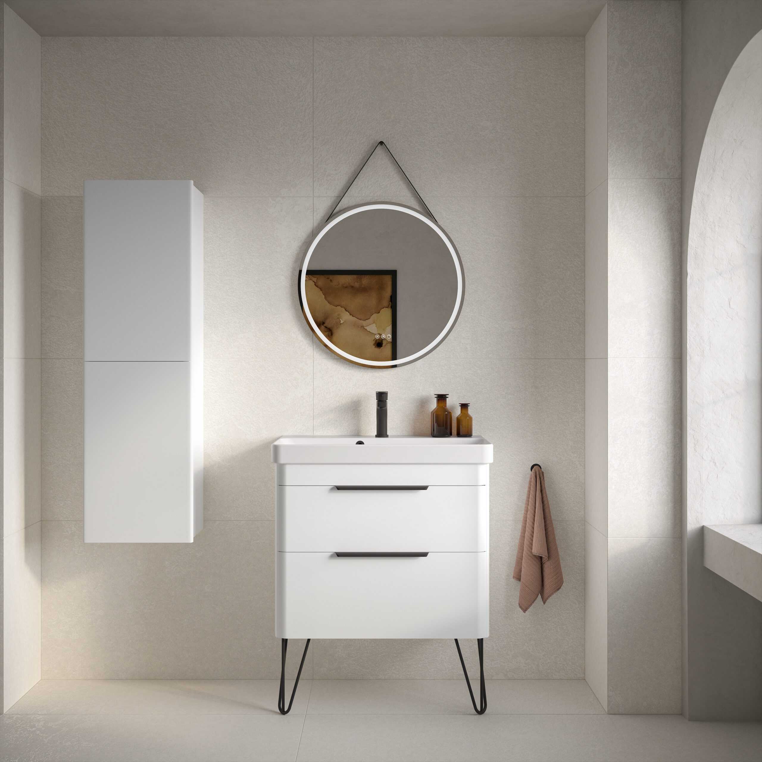 Sleek modern bathroom vanity with a mirror and stylish accessories in a contemporary bathroom setting.