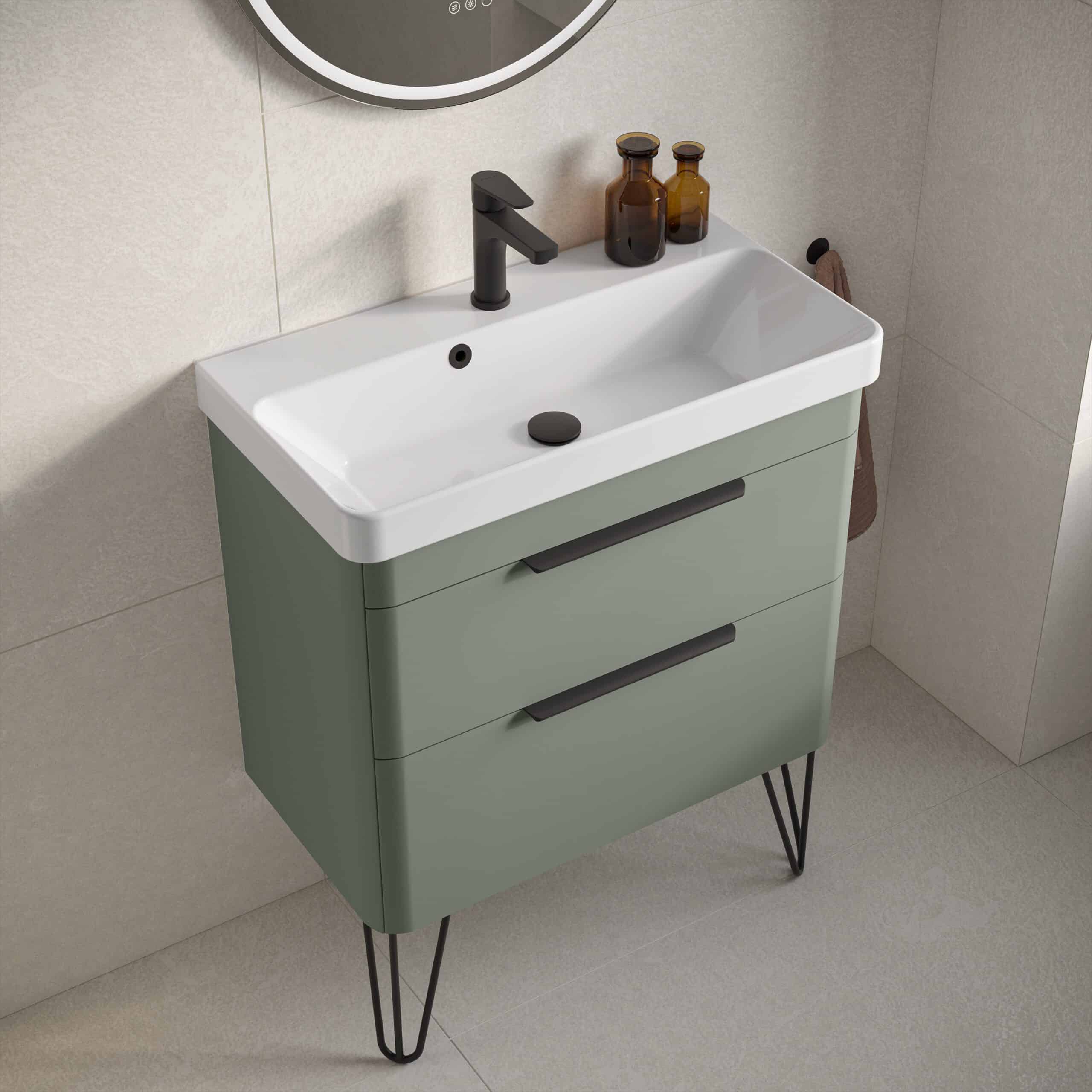 Modern bathroom vanity with a white ceramic sink, black matte tap, and two brown glass bottles on a beige tiled wall. Stylish bathroom furniture designed for contemporary spaces.